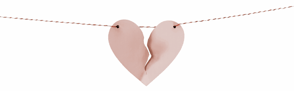 Illustration d’un cœur brisé suspendu à un fil, symbole de rupture et de réparation possible dans la relation de couple